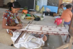 This 15-year-old girl has learnt the mapa'uf weaving technique from her grandmother, and memorised this pattern. The transfer of knowledge also requires sacred prayers and rituals. The back-strap on her loom maintains the cloth's tension but can cause painful pressure.